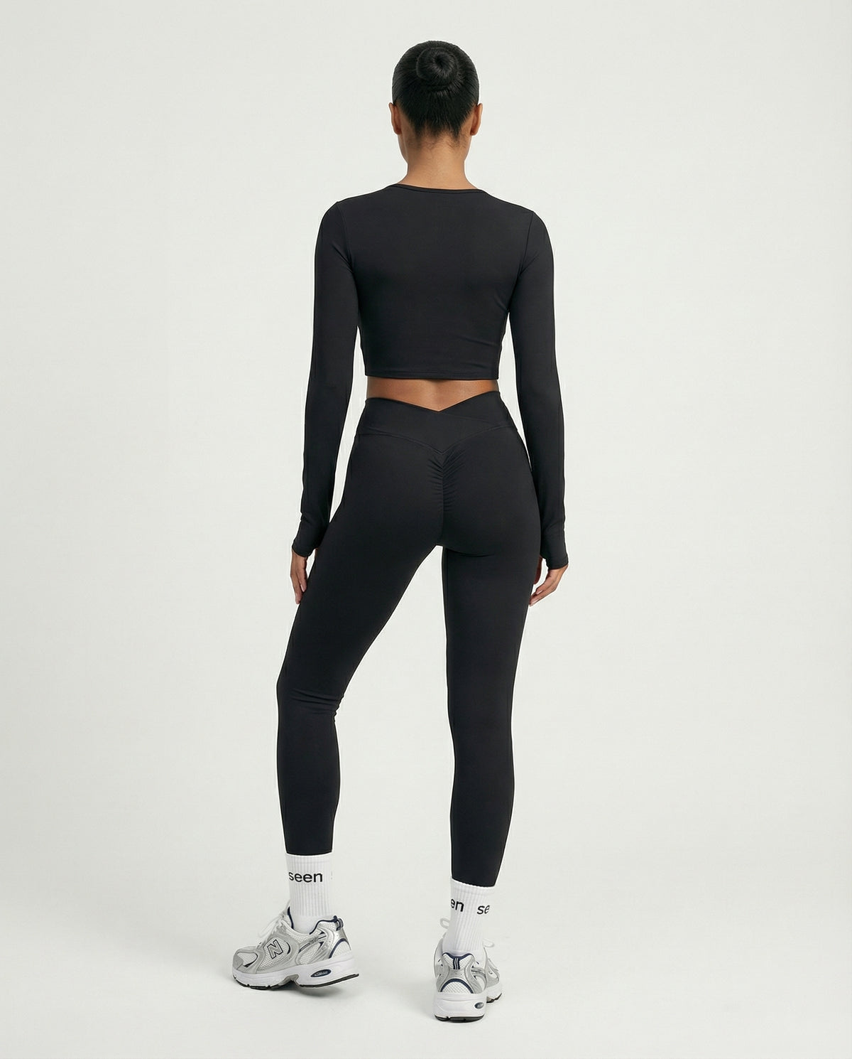 Seen women's activewear set featuring a long sleeve top and high-waist leggings, perfect for workout and athleisure wear.