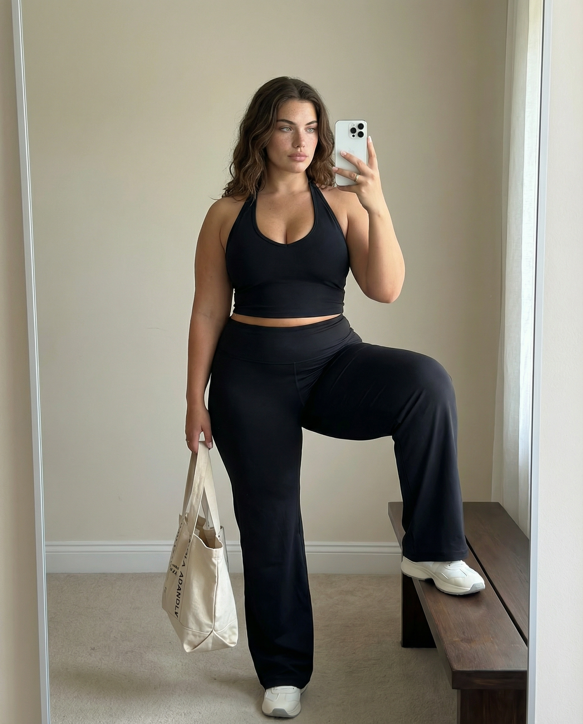 Seen women's sports top with halter neck, seamless sculpting fit, part of activewear set, designed for comfortable movement.