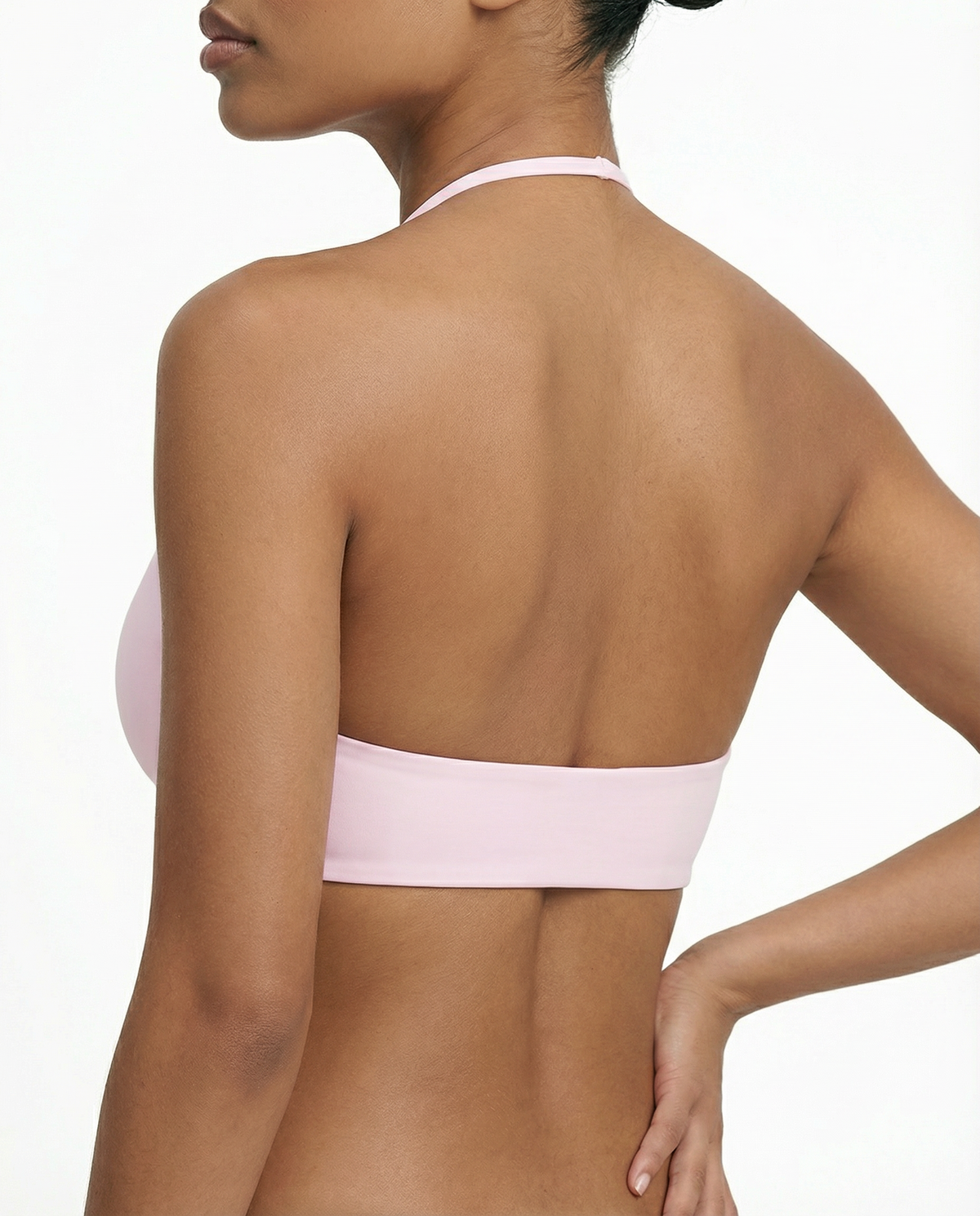 Women’s seamless wireless halter sports bra by seen, featuring a triangle design and stretchy fabric for comfortable support.