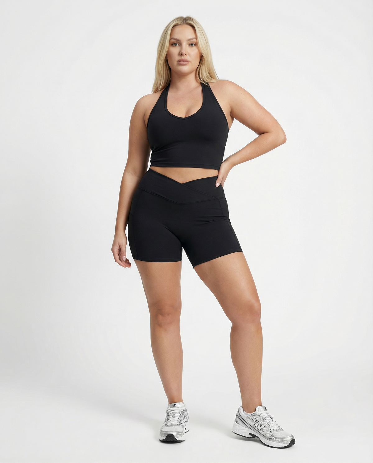 Seen women's activewear set with a black halter top and high waist matching shorts, ideal for workout and fitness activities.