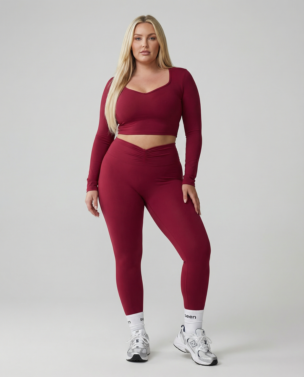 Seen women's activewear set with long sleeve top and high-waist leggings, stylish and comfortable for workouts and casual wear.
