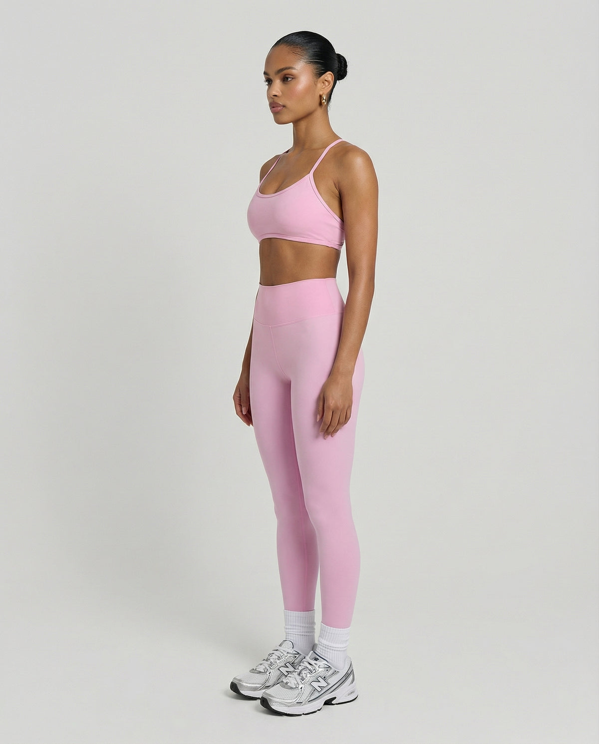 Seen women's seamless workout set with high waist leggings and matching top, designed for active and sculpting fitness wear.