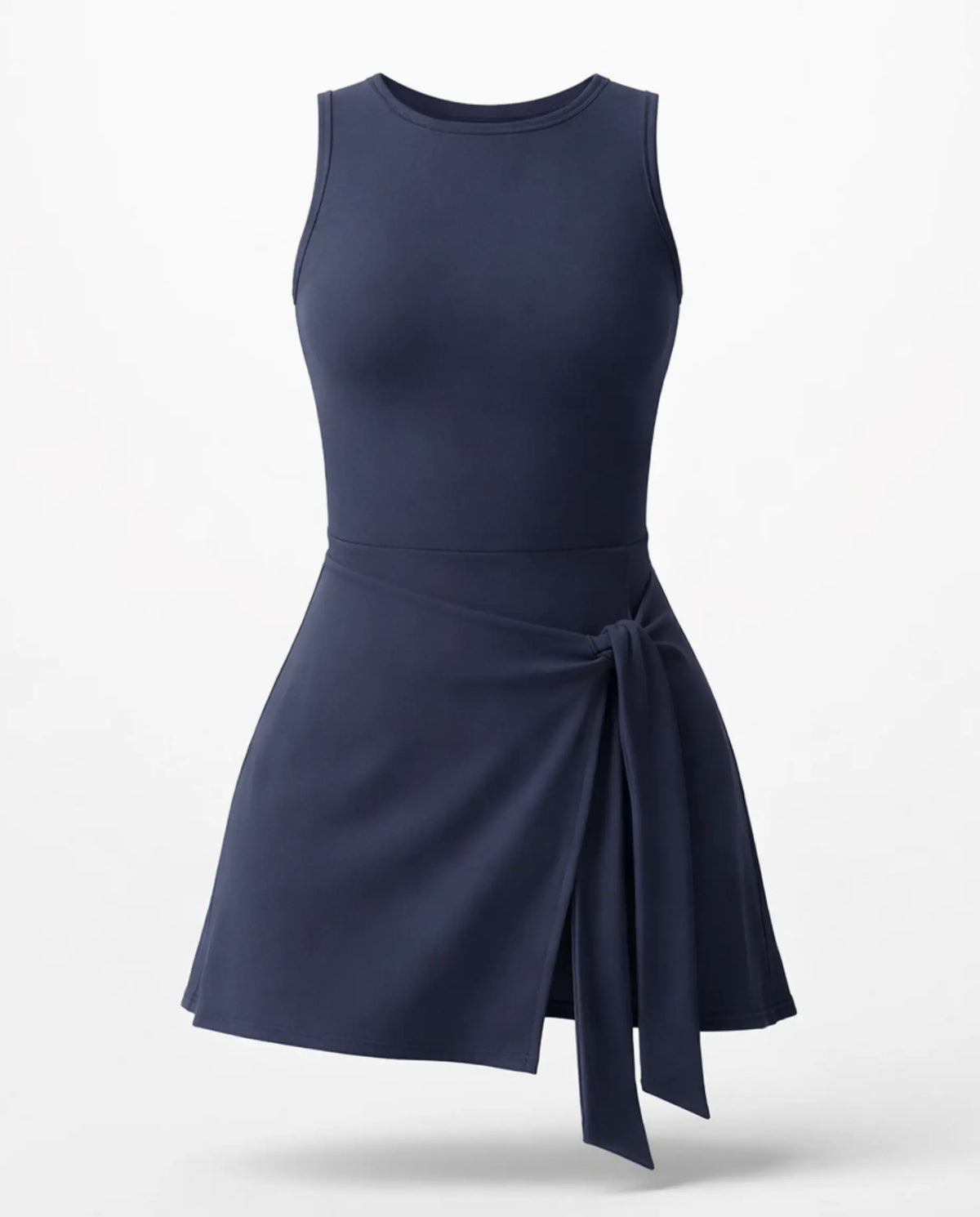 Woman wearing blue active dress with wrap skirt detail in a lifestyle setting, styled for casual athleisure wear.