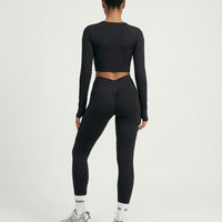 Seen women's activewear set featuring a long sleeve top and high-waist leggings, perfect for workout and athleisure wear.