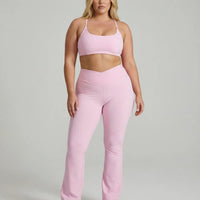 Seen women's activewear set with yoga flare leggings and matching sculpt fit sports bra, designed for comfort and style.