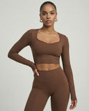 Seen women's activewear set with long sleeve top and high waist leggings, in a comfortable, fitted design for active wear.