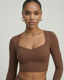 Seen women's activewear set with long sleeve top and high waist leggings, ideal for workout and active lifestyle.
