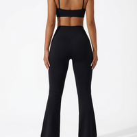 Seen women's flare yoga pants set featuring high waist leggings and matching sports bra, ideal for activewear and yoga sessions.
