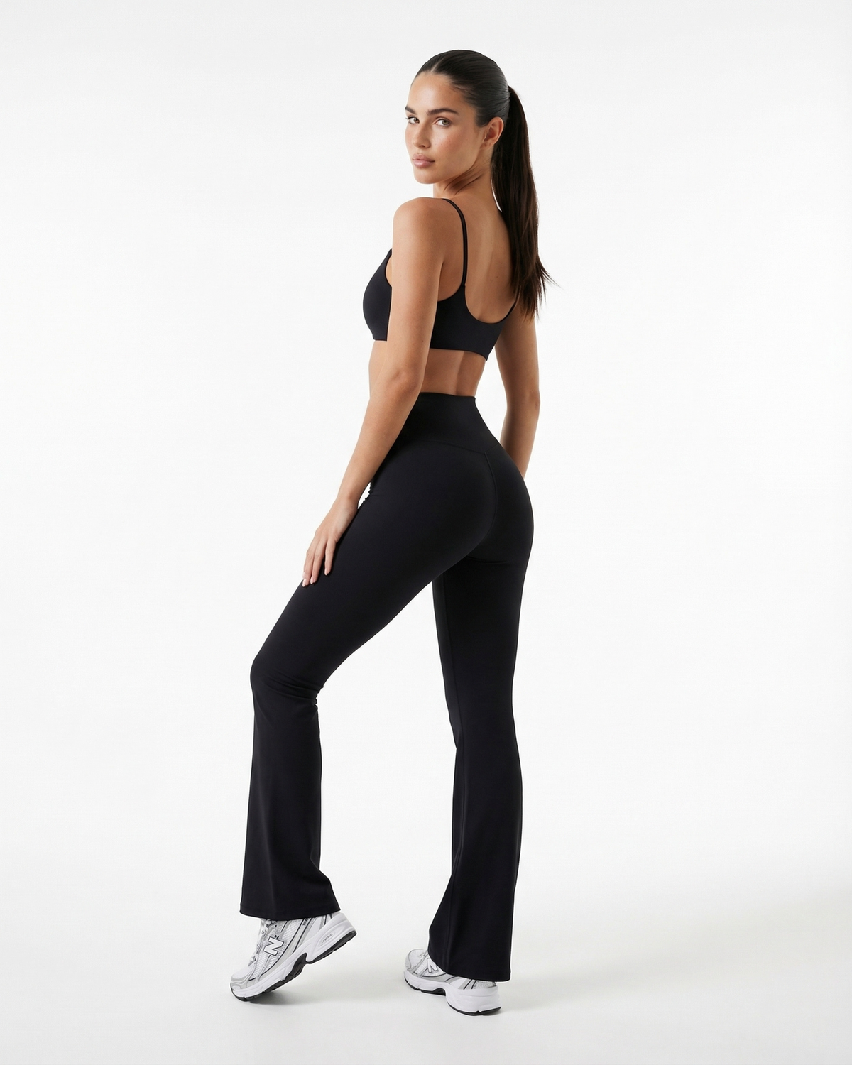 Seen women's flare yoga pants set with high waist leggings and matching sports bra, ideal for activewear and yoga sessions.