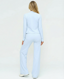 Women's Seen 3-piece set with flare pants, sports bra, and jacket, featuring stylish, comfortable activewear in coordinated design.