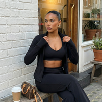 Women's 3-piece flare pants, sports bra, and jacket set by seen, featuring a coordinated activewear look with stylish fit and design.