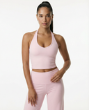 Seen flare yoga pants set with high waist and halter sports bra, featuring stylish flare leggings and supportive workout top.