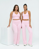Seamless women's sports top with halter neck, sculpting fit, in black, designed for active wear by seen.