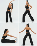 Seen flare yoga pants set with high waist and halter sports bra, shown in black fabric with flared leg design.