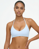 Seen women's seamless wireless halter triangle sports bra, showing soft fabric, supportive fit, and stylish design.
