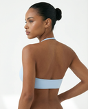Seen women's seamless wireless halter triangle sports bra, soft fabric, and supportive design perfect for active wear.