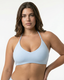 Women's seamless wireless halter triangle sports bra by seen, shown in a close-up view highlighting its smooth fabric and supportive design.