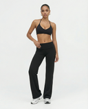 Seen women's seamless wireless halter triangle sports bra with soft fabric and supportive fit, shown on a neutral background.