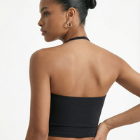 Seen women's sports top with halter neck, seamless sculpting fit, part of activewear set, shown on a mannequin.