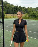 Seen active padel skirt set featuring a sporty skirt and matching top, designed for comfortable play and athletic style.