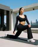 Seen flare yoga pants set with high waist and long sleeve crop top, featuring a stylish, comfortable athletic loungewear look.