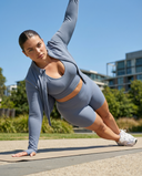 Seen women's 3-piece workout set with a jacket, sports bra, and shorts, featuring breathable athletic fabric and stylish fit.