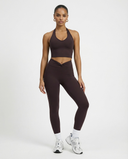 Seen high waist leggings set with sculpting fit and halter top, perfect for women's activewear and workout fashion.