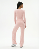 Seen flare yoga pants set featuring high waist wide-leg pants and matching crop top, ideal for comfortable activewear.