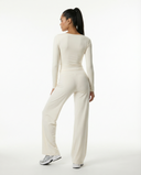 Seen flare yoga pants set with high waist wide-leg pants and matching crop top, perfect for activewear and workouts.