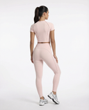 Seen women's activewear set featuring a sculpting crop top and matching leggings, displayed on a white background.