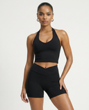 Seen women's activewear set with a halter top and high waist shorts, featuring a stylish, fitted design perfect for workouts.