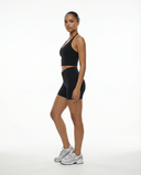 Seen women's activewear set with a halter top and high-waist shorts, shown in a stylish, comfortable workout outfit.