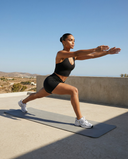 Women's activewear set with halter top and high-waist shorts by seen, featuring a stylish, comfortable workout outfit.
