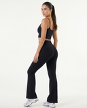Seen Snatched V-Waist Flare Leggings featuring a high waist and flared leg design, shown in black fabric.