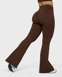Seen Snatched V-Waist Flare Leggings shown in black with a high V-waist and flared leg design, made from stretchy, comfortable fabric.