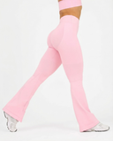 Seen Snatched V-Waist Flare Leggings in black, featuring a high waist and flare design, shown on a model.