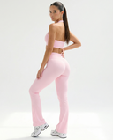 Seen Snatched V-Waist Flare Leggings displayed on a model, showcasing their high-waisted fit and flared leg design.