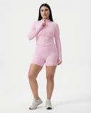 Seen women's workout set with zip jacket and sculpting shorts, featuring breathable fabric and athletic fit for activewear.
