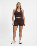 Seen women's activewear set with halter top and high waist shorts, perfect for workout or athletic activities.