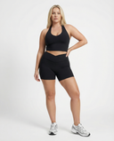 Seen women's activewear set with a black halter top and high waist matching shorts, ideal for workout and fitness activities.