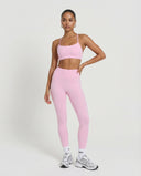Seen women's seamless workout set with high waist leggings and matching top, designed for activewear and fitness activities.