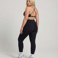 Seen women's seamless workout set featuring high waist sculpting leggings and matching top, ideal for activewear and fitness.