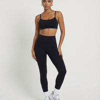 Seen seamless workout set featuring sculpting high waist leggings and matching top for women’s activewear.