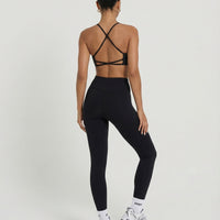 Seen women's seamless workout set featuring sculpting high waist leggings and matching sports top, ideal for activewear and fitness.
