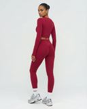 Seen women's activewear set with long sleeve top and high waist leggings, designed for comfortable workout wear.