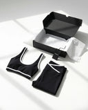 Woman wearing seamless sculpt activewear set with high waist leggings and supportive sports bra designed for gym, yoga, and athleisure wear.
