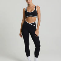 Woman wearing seamless sculpt activewear set with high waist leggings and supportive sports bra designed for gym, yoga, and athleisure wear.