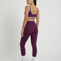 Woman wearing seamless sculpt activewear set with high waist leggings and supportive sports bra designed for gym, yoga, and athleisure wear.