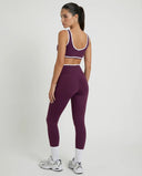 Woman wearing seamless sculpt activewear set with high waist leggings and supportive sports bra designed for gym, yoga, and athleisure wear.