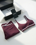 Woman wearing seamless sculpt activewear set with high waist leggings and supportive sports bra designed for gym, yoga, and athleisure wear.